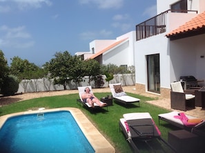 Lounging by the private pool.