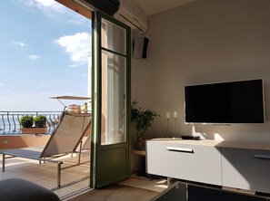 Living area with flat screen smart TV