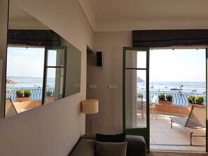 Living Area with Feature Mirror reflecting the beautiful view.