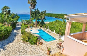 Villa opens directly onto the beach