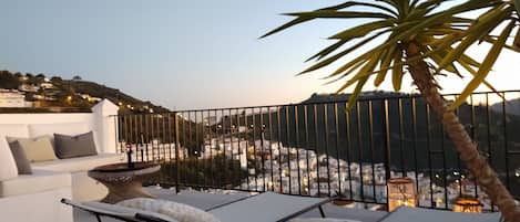 upper sun terrace with beautiful views of the sea, mountains and village. 