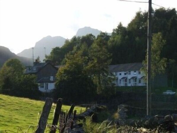 Langdale Pikes behind the cottage- view from path to village 