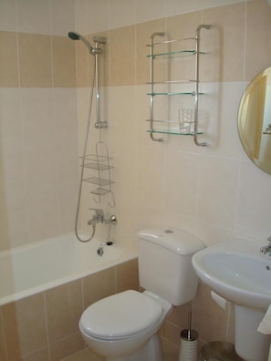 Good size family bathroom with bath and shower
