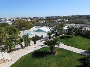 view of the garden and pool