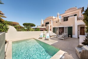 Front/pool, sunbeds and comfortable seating