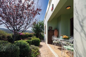 Dining area outdoors in our colourful garden