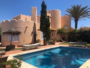 View of villa and swimming pool from the garden
