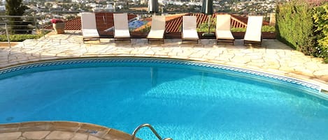 Pool area with sea view