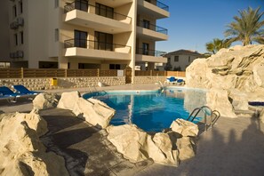 Our apartments the bottom left veranda.  Perfectly overlooking the pool.