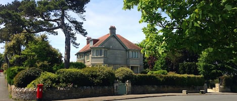 The house sits in half an acre of private garden