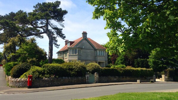 The house sits in half an acre of private garden