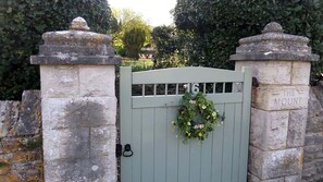 Hidden behind tall hedges and Purbeck stone walls