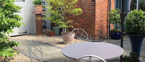 Private outside terrace and garden with seating for seven