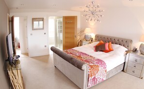 Master bedroom with lovely views out to the coast