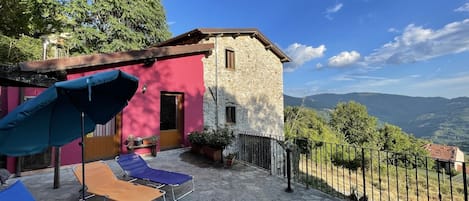 Looking across the patio to the house (newly painted)