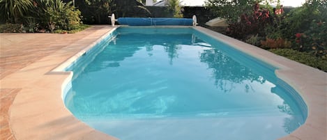 You will love the large, private, solar heated pool.