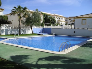 The pool and gardens across from our house