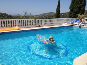 Family enjoying the pool