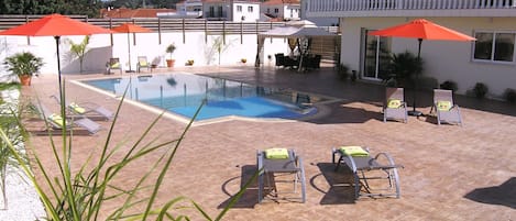 Enormous patio with 10m x 5m infinity pool.