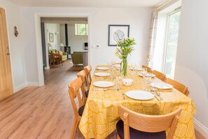 Dining room looking towards kitchen and living area