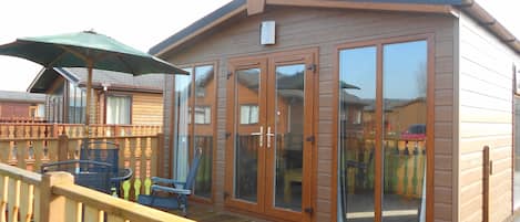 Lodge patio doors and decking close up