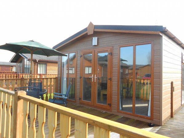 Lodge patio doors and decking close up