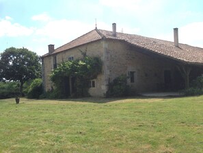 The rear showing shaded outdoor eating area