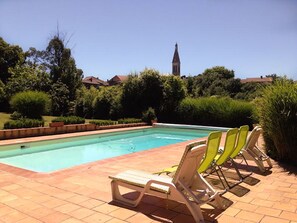 The pool with views towards the village church