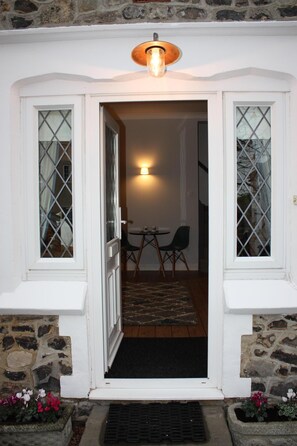 Private entrance, front door into sitting room.