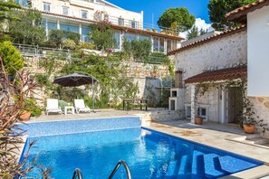 Swimming pool and sunbathing areas