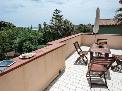 CALABERNARDO APARTMENT; 50 meters from the sea cliff, 400 meters from the sea with the beach, SPECIAL OFFER