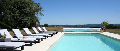 Swimming pool and sun terrace with panoramic far reaching views