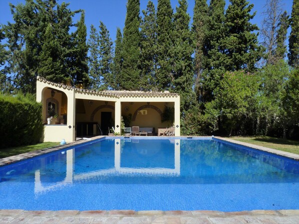 Swimming pool of 15 x 6 m. and outdoor dining area