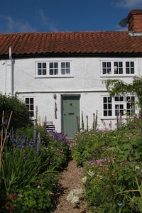 Views over open farmland ideally situated for exploring the Suffolk coast 