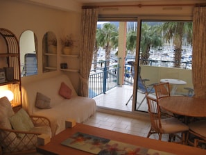 lounge and balcony with marina views
