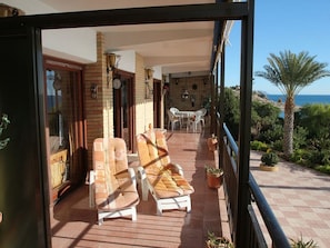 Terrace with sunbeds and furniture to relax and enjoy te amazing view!!