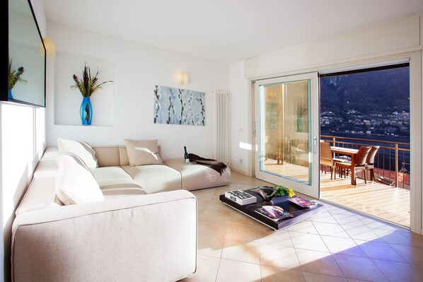 Lovely light lounge and open plan living at "Stylish Lake View Garden Apartment"