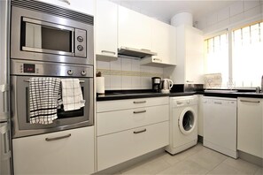 Modern kitchen is fully fitted with all the appliances