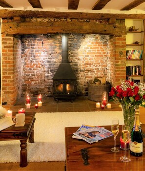 Enjoy the warming log burner in the inglenook fireplace within the lounge.