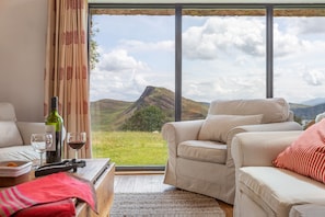 Sitting room with view of Comaum Crag, a delightful climb.
