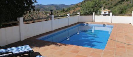 Lovely private pool used by guests only right next to the house. Lovely view!