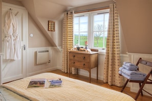 Loft bedroom overlooking countryside