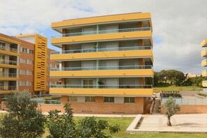 Back view, apartment located top floor right hand side