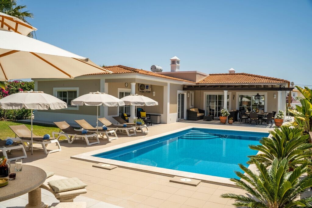 Beige-toned villa rental with a swimming pool