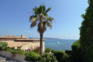 Stunning view from car park over the cool swimming pool to sea beyond