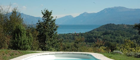 Lake Garda and mountain views from the pool of Monte Pico