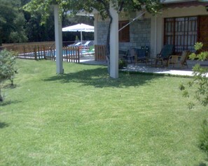 View of the ground floor apartment with the pool