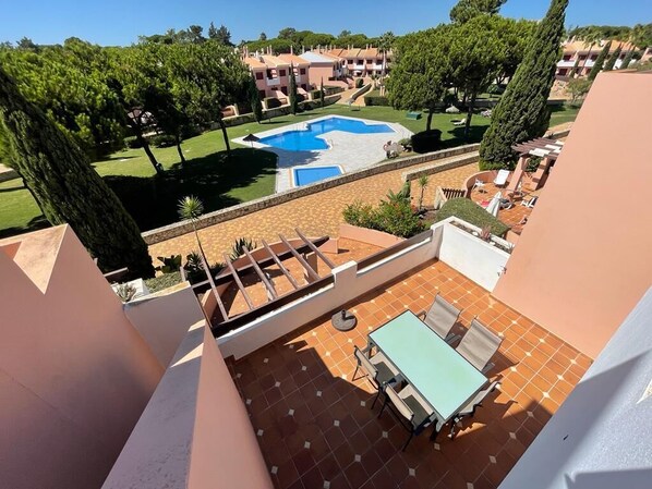 View from roof terrace across the pool