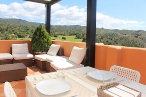 Golf Views while eating outside in the terrace