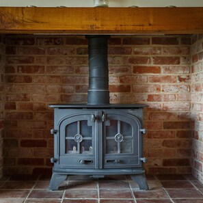Wood provided October to May.  Oil fired central heating.  Underfloor heating.